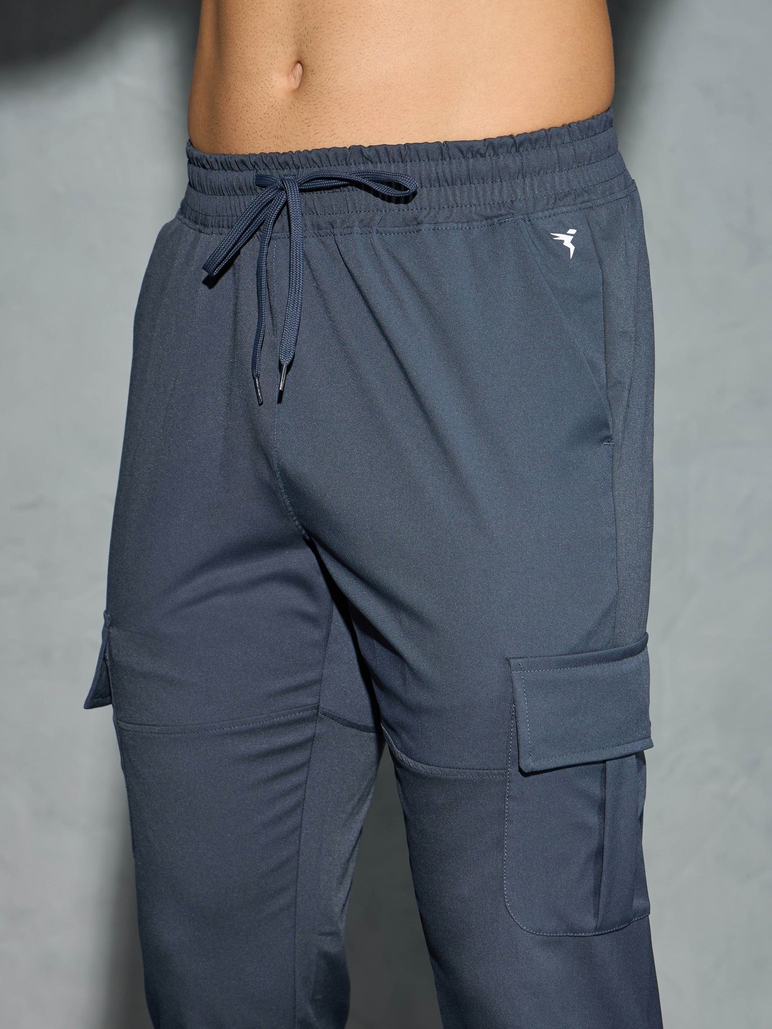 OR99 Men Solid Relax Fit Sports Cargo Trackpants | VINTAGE INDIGO